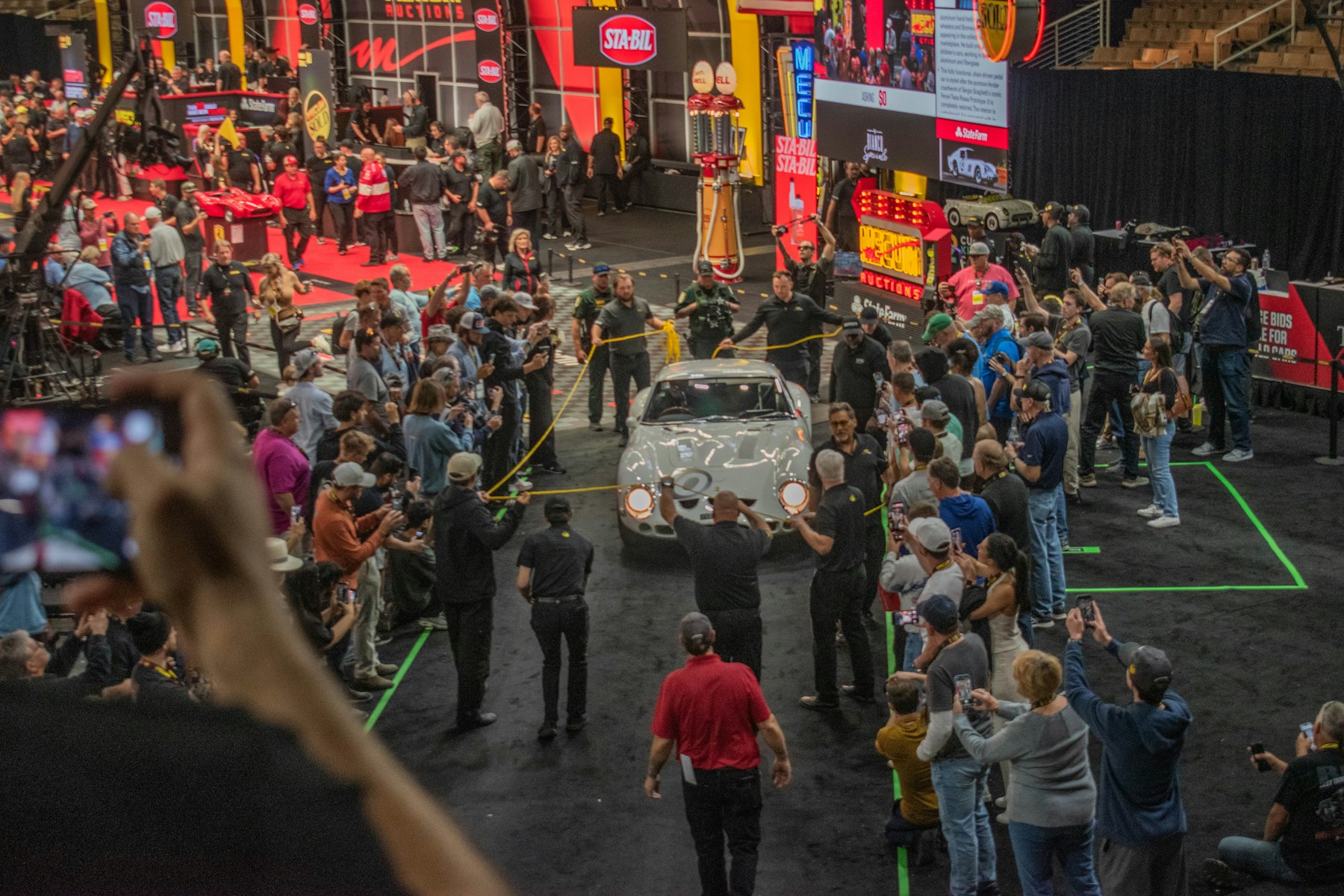 Audience watching a winning car presentation